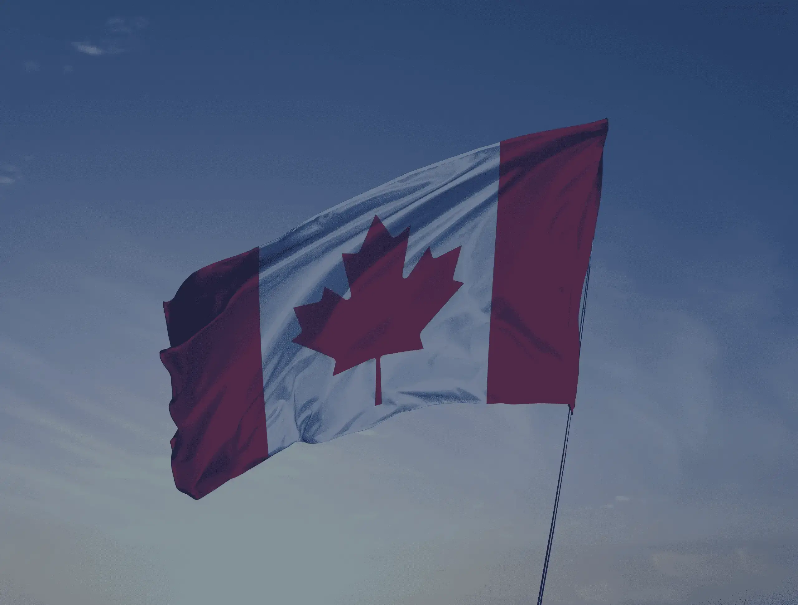canadian flag with sky clouds scaled new