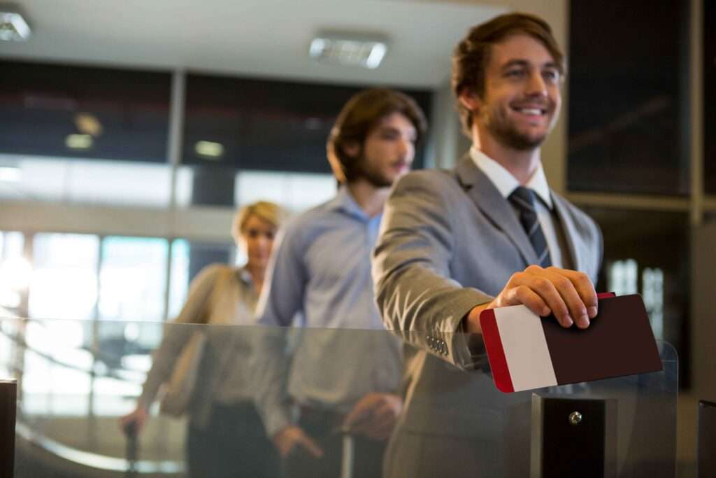 businessman standing with boarding pass check counter 1